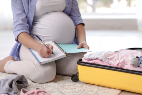 pregnant woman packing